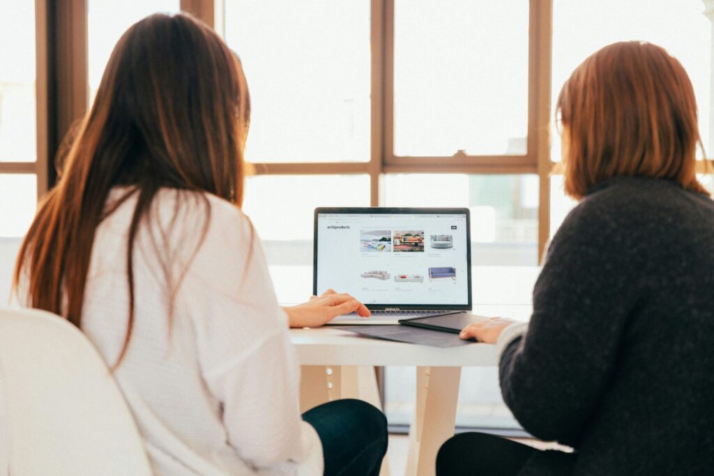women discussing marketing